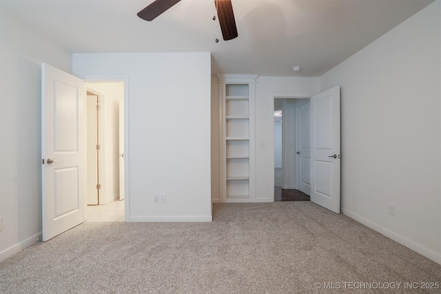 16958 E 45th St, Tulsa, OK 74134 - unfurnished bedroom featuring carpet and a ceiling fan