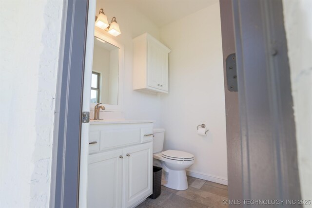 16958 E 45th St, Tulsa, OK 74134 - bathroom featuring toilet and vanity