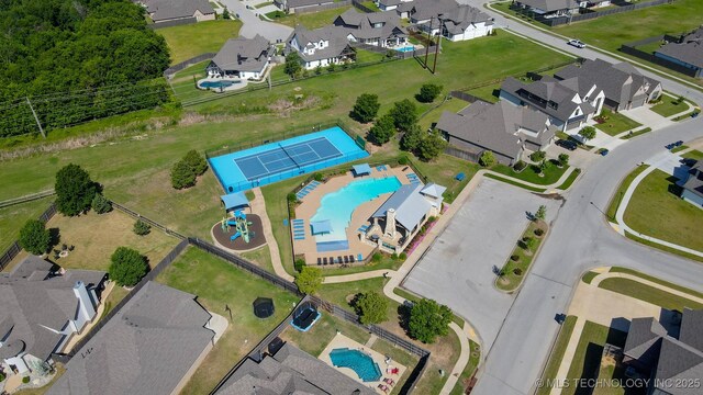 16958 E 45th St, Tulsa, OK 74134 - aerial perspective of suburban area with a pool