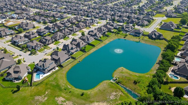 16958 E 45th St, Tulsa, OK 74134 - aerial view of property's location with a nearby body of water and nearby suburban area