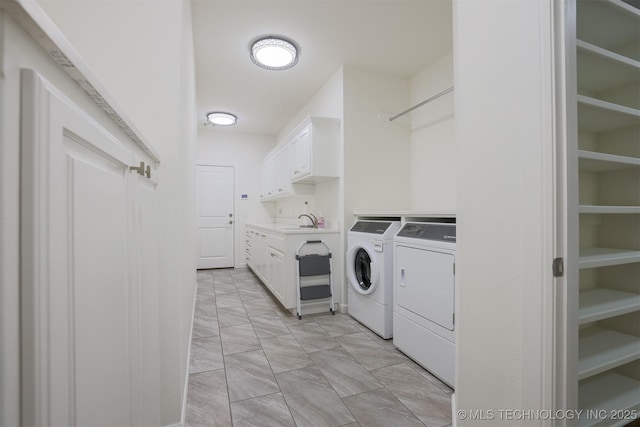 16958 E 45th St, Tulsa, OK 74134 - washroom with washer and clothes dryer and cabinet space