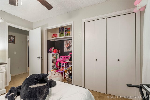 30341 E 144th St, Coweta, OK 74429 - bedroom with light colored carpet, a textured ceiling, a closet, and ceiling fan