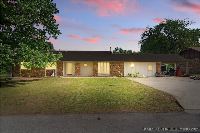30341 E 144th St, Coweta, OK 74429 - view of front of property featuring stone siding, driveway, and a yard