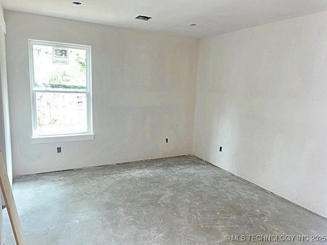 empty room with concrete floors