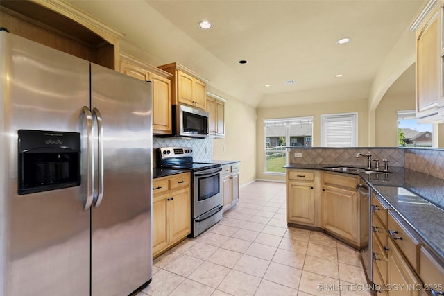2000 W Vail St, Broken Arrow, OK 74012 - kitchen featuring appliances with stainless steel finishes, a sink, tasteful backsplash, recessed lighting, and light tile patterned floors