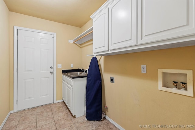 2000 W Vail St, Broken Arrow, OK 74012 - laundry area featuring cabinet space, electric dryer hookup, baseboards, and hookup for a washing machine