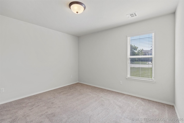 2000 W Vail St, Broken Arrow, OK 74012 - carpeted spare room featuring baseboards