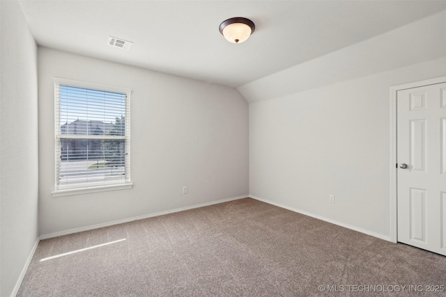 2000 W Vail St, Broken Arrow, OK 74012 - carpeted empty room featuring baseboards and vaulted ceiling