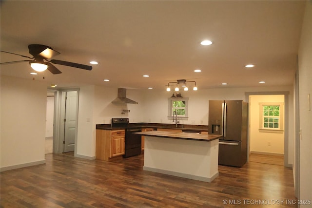 1185 E Pine St, Westville, OK 74965 - kitchen with black range with electric cooktop, stainless steel refrigerator with ice dispenser, wall chimney exhaust hood, dark wood-type flooring, and a center island