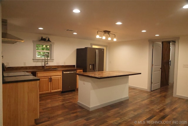 1185 E Pine St, Westville, OK 74965 - kitchen with a sink, refrigerator with ice dispenser, wall chimney exhaust hood, dishwasher, and dark countertops