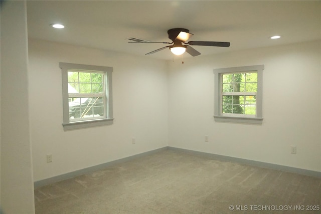 1185 E Pine St, Westville, OK 74965 - carpeted empty room featuring plenty of natural light, a ceiling fan, recessed lighting, and baseboards
