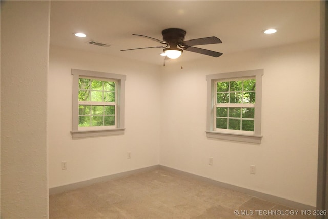 1185 E Pine St, Westville, OK 74965 - unfurnished room with plenty of natural light, a ceiling fan, recessed lighting, and baseboards