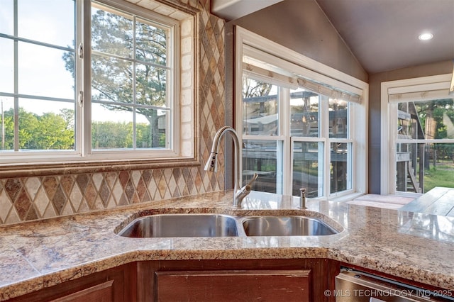 5378 W 450th Rd, Pryor, OK 74361 - kitchen featuring a sink, plenty of natural light, dishwasher, backsplash, and vaulted ceiling