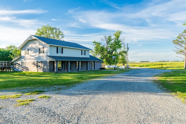 5378 W 450th Rd, Pryor, OK 74361 - view of front of property with gravel driveway, a porch, and a front yard