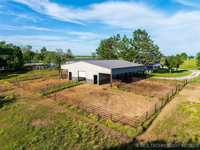5378 W 450th Rd, Pryor, OK 74361 - view of outdoor structure featuring an exterior structure, driveway, an outdoor structure, and a rural view
