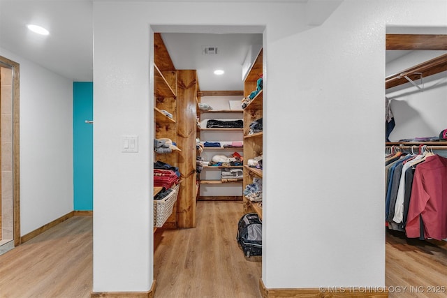 5378 W 450th Rd, Pryor, OK 74361 - spacious closet with wood finished floors