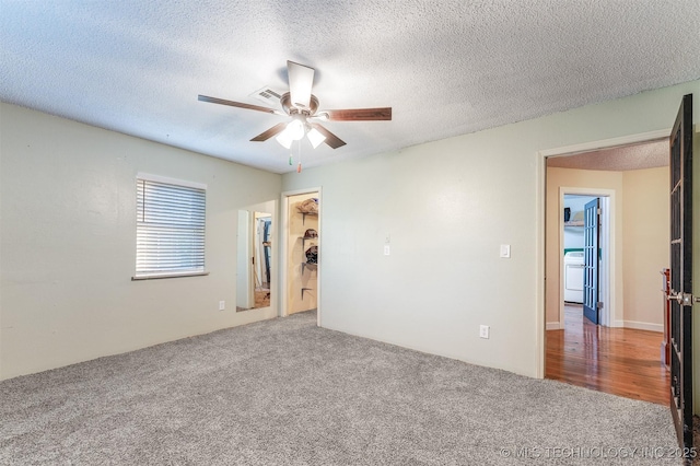 5378 W 450th Rd, Pryor, OK 74361 - unfurnished room with carpet floors, washer / clothes dryer, ceiling fan, and a textured ceiling