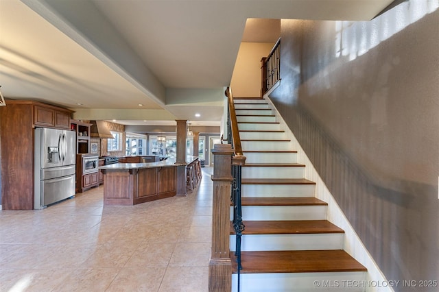 5378 W 450th Rd, Pryor, OK 74361 - stairway featuring tile patterned floors and recessed lighting