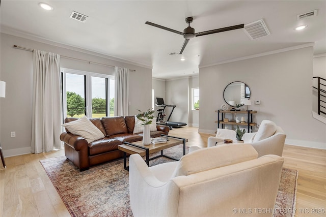 3741 Riverside Dr Unit 3741, Tulsa, OK 74105 - living area featuring crown molding, a ceiling fan, light wood-style flooring, recessed lighting, and baseboards