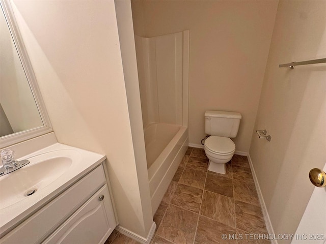 7333 W 36th St, Tulsa, OK 74107 - full bathroom with toilet, vanity, and baseboards