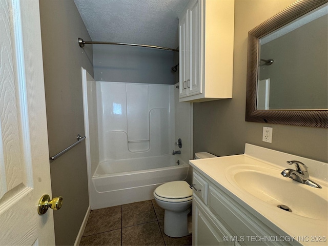 2836 E Admiral Blvd, Tulsa, OK 74110 - full bath with toilet, vanity, washtub / shower combination, tile patterned flooring, and a textured ceiling