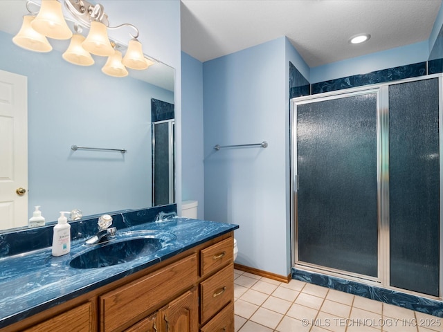 1310 Prairie Heights Dr, Bartlesville, OK 74006 - bathroom featuring a shower stall, tile patterned flooring, and vanity