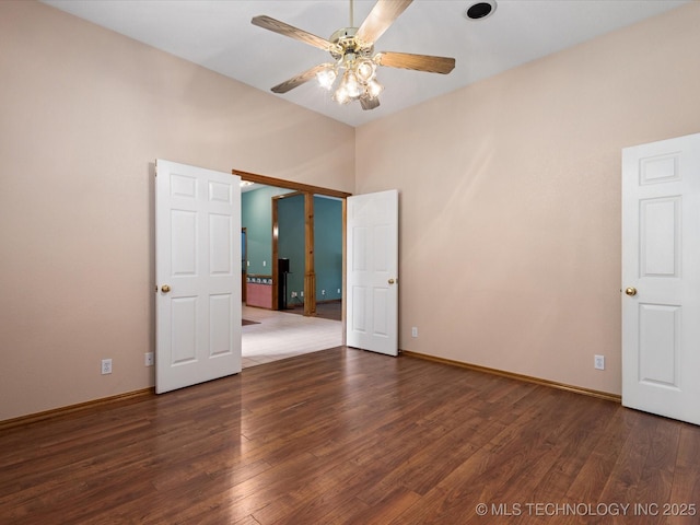 1310 Prairie Heights Dr, Bartlesville, OK 74006 - unfurnished room with ceiling fan, wood finished floors, and baseboards