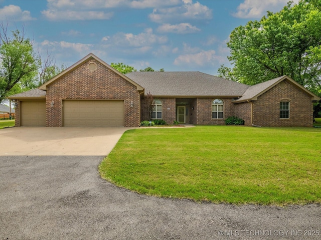 1310 Prairie Heights Dr, Bartlesville, OK 74006 - ranch-style home with a garage, brick siding, a front yard, concrete driveway, and a shingled roof