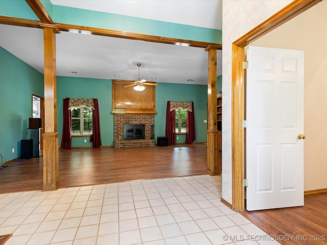 1310 Prairie Heights Dr, Bartlesville, OK 74006 - unfurnished living room featuring healthy amount of natural light and light wood-style flooring