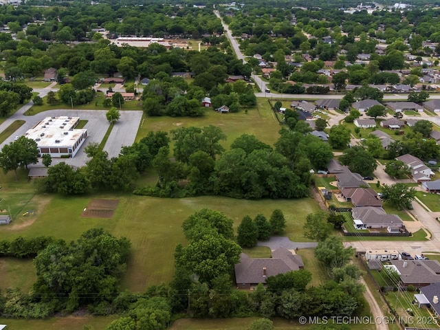 1310 Prairie Heights Dr, Bartlesville, OK 74006 - bird's eye view of a tree filled landscape