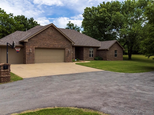1310 Prairie Heights Dr, Bartlesville, OK 74006 - ranch-style house featuring brick siding, a garage, a front lawn, concrete driveway, and a shingled roof