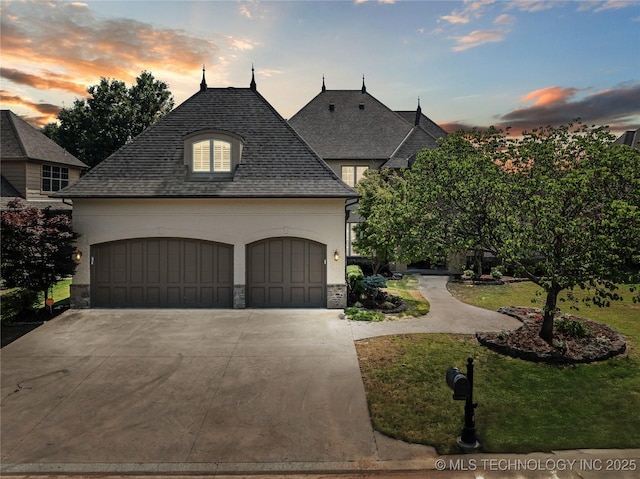 11408 S Harvard Ave, Tulsa, OK 74137 - french country style house with stucco siding, a garage, stone siding, and concrete driveway
