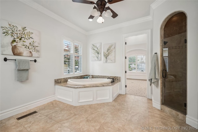 11408 S Harvard Ave, Tulsa, OK 74137 - full bath featuring a ceiling fan, a shower stall, a bath, ornamental molding, and baseboards