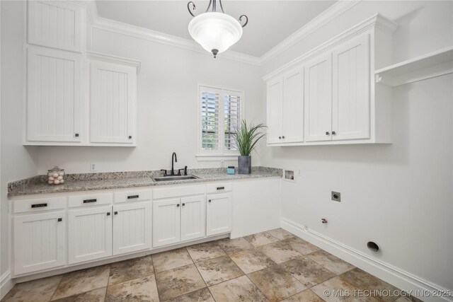 11408 S Harvard Ave, Tulsa, OK 74137 - laundry room featuring hookup for an electric dryer, baseboards, hookup for a gas dryer, washer hookup, and crown molding
