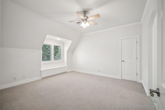 11408 S Harvard Ave, Tulsa, OK 74137 - additional living space with carpet floors, ceiling fan, baseboards, and arched walkways