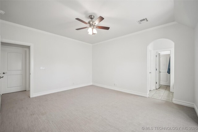 11408 S Harvard Ave, Tulsa, OK 74137 - spare room with light colored carpet, a ceiling fan, baseboards, and crown molding