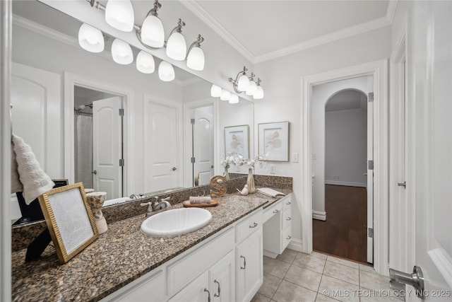 11408 S Harvard Ave, Tulsa, OK 74137 - bathroom featuring tile patterned floors, crown molding, vanity, and baseboards