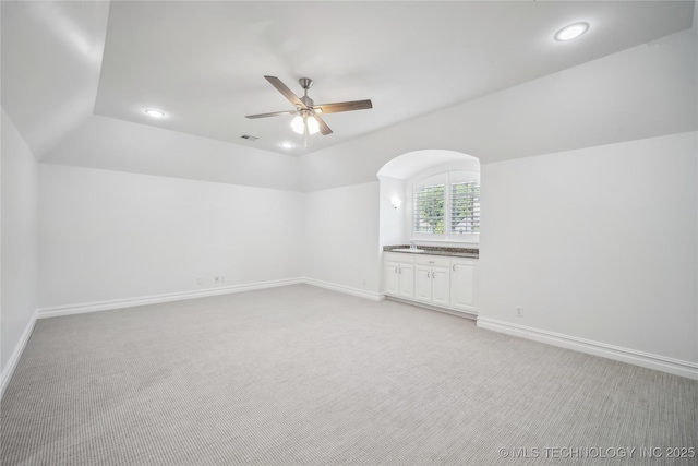 11408 S Harvard Ave, Tulsa, OK 74137 - additional living space with light colored carpet, a ceiling fan, baseboards, and recessed lighting