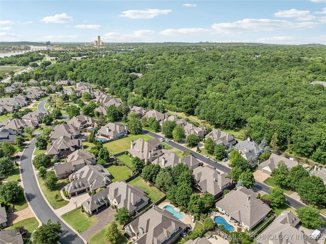 11408 S Harvard Ave, Tulsa, OK 74137 - aerial perspective of suburban area featuring a forest