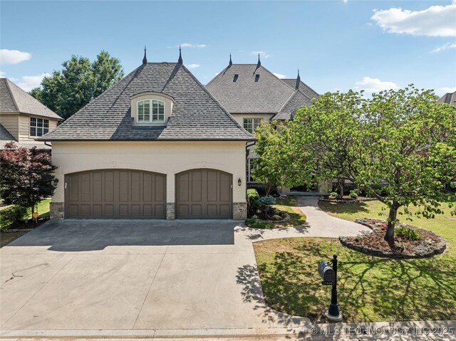 11408 S Harvard Ave, Tulsa, OK 74137 - french country style house featuring driveway, stucco siding, a garage, and a front yard
