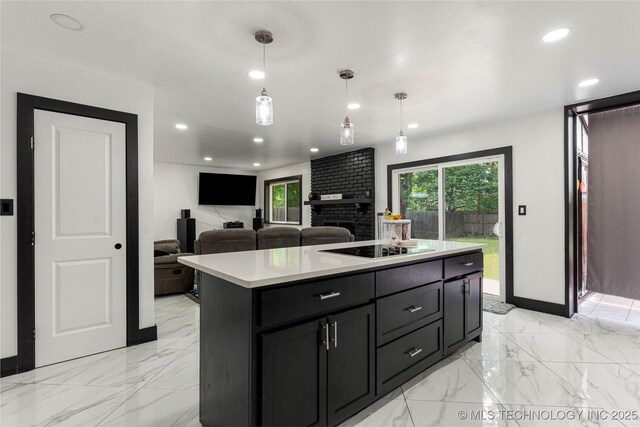 2122 E 52nd St, Tulsa, OK 74105 - kitchen with recessed lighting, black electric stovetop, a brick fireplace, dark cabinets, and light countertops