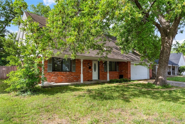 2122 E 52nd St, Tulsa, OK 74105 - view of front of property with an attached garage, brick siding, driveway, and roof with shingles