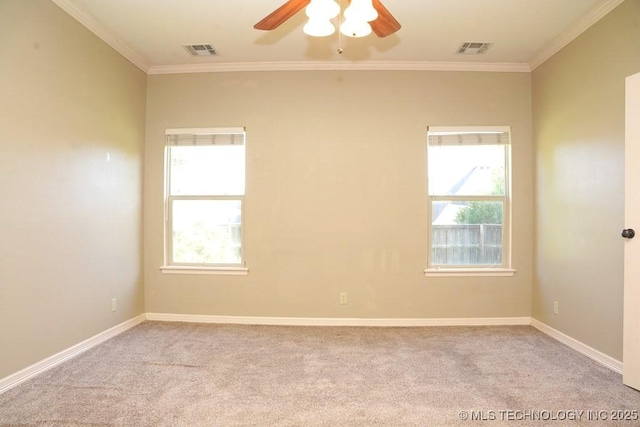 717 W 39th St, Sand Springs, OK 74063 - spare room featuring ornamental molding, light carpet, ceiling fan, and baseboards