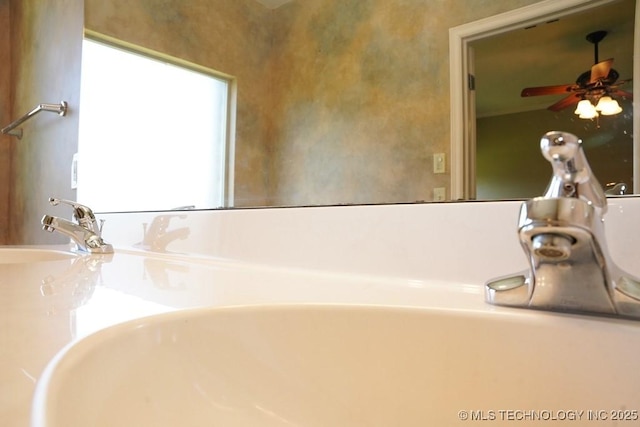 717 W 39th St, Sand Springs, OK 74063 - bathroom featuring a ceiling fan