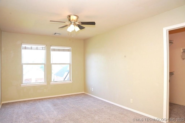 717 W 39th St, Sand Springs, OK 74063 - carpeted spare room featuring ceiling fan and baseboards