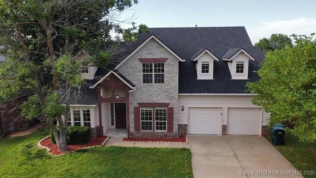 717 W 39th St, Sand Springs, OK 74063 - traditional-style house with an attached garage, concrete driveway, a front lawn, roof with shingles, and brick siding
