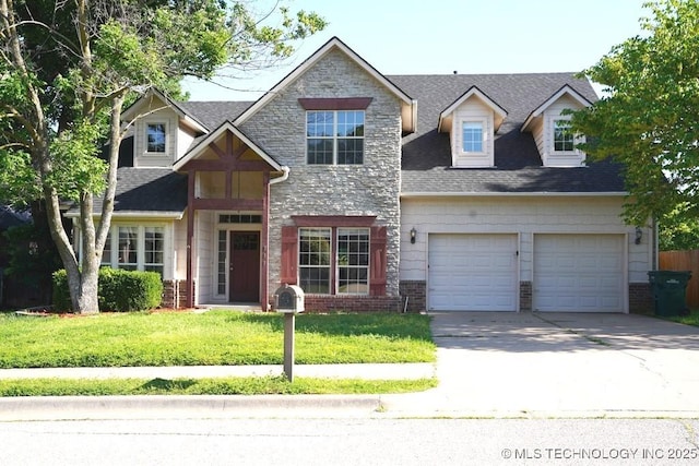 717 W 39th St, Sand Springs, OK 74063 - view of front of property with concrete driveway, a front lawn, brick siding, and a garage