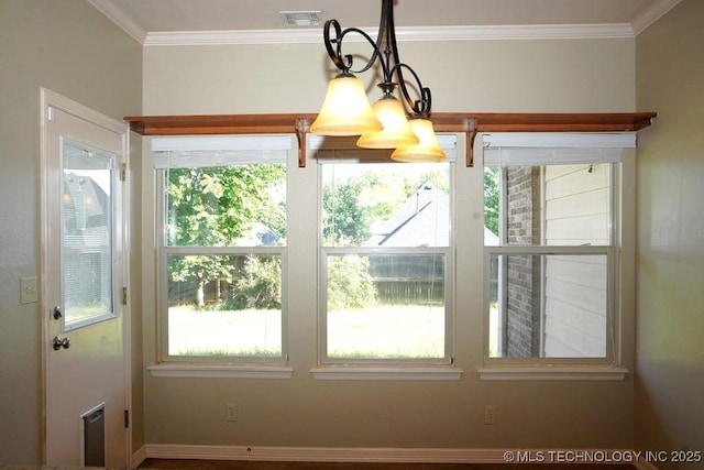 717 W 39th St, Sand Springs, OK 74063 - unfurnished dining area with ornamental molding