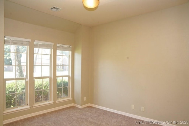 717 W 39th St, Sand Springs, OK 74063 - spare room with carpet, baseboards, and plenty of natural light