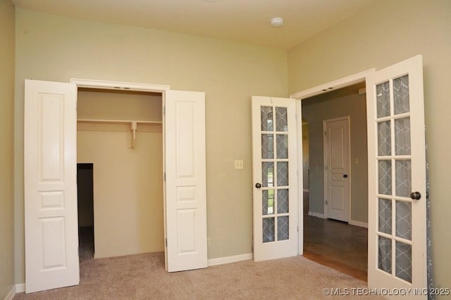 717 W 39th St, Sand Springs, OK 74063 - unfurnished bedroom with carpet, a closet, and baseboards